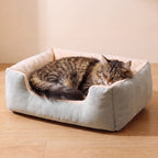 Hug Bolster Bed - Sage - with a cat