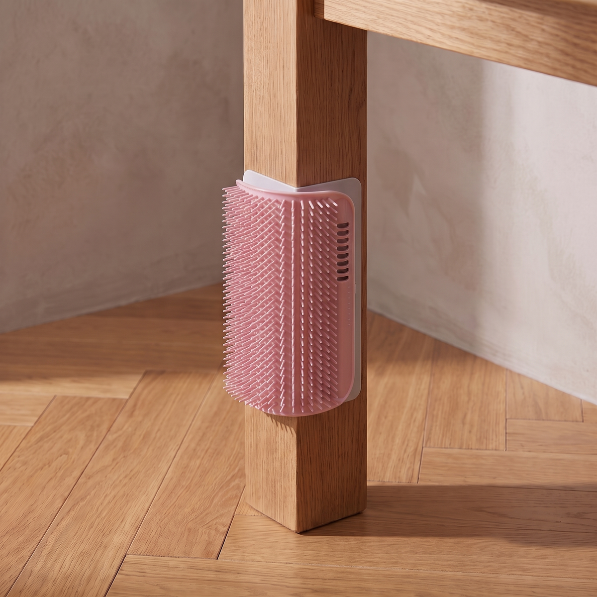 Nook Corner Groomer - Pink - on a table leg