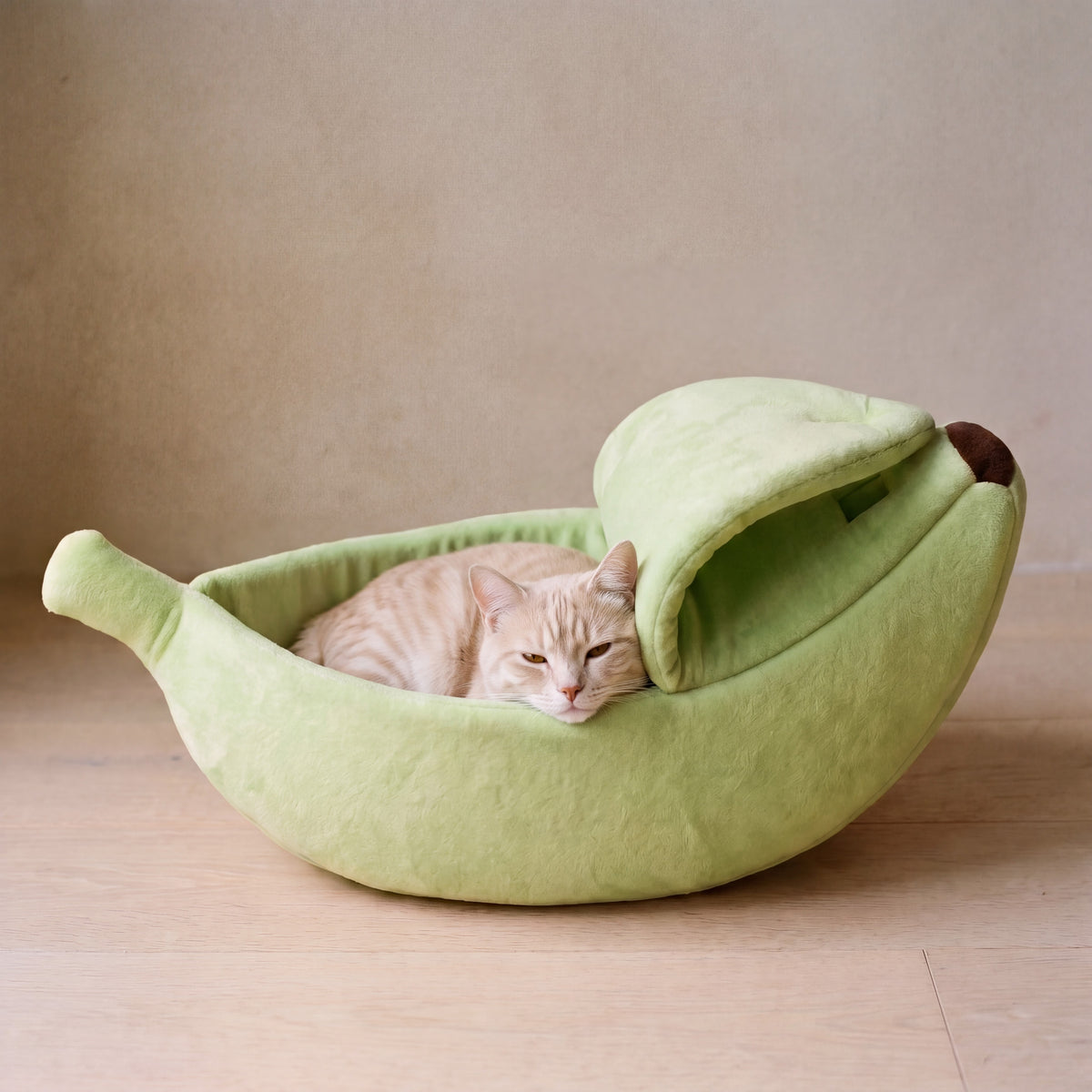 Snug Banana Bed - light green - with a cat