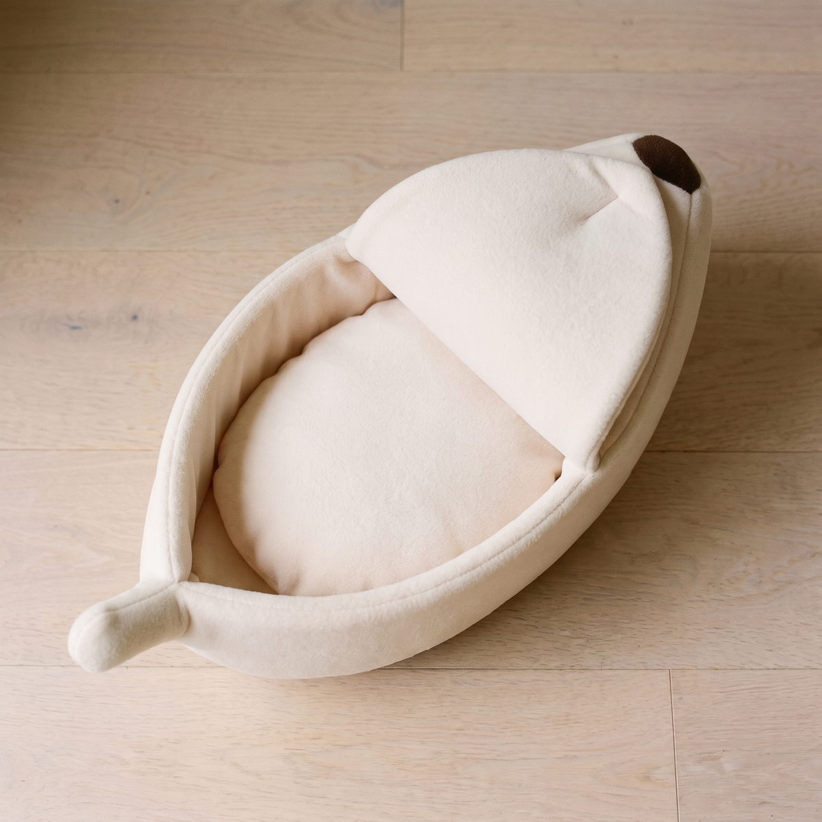 Snug Banana Bed white banana cat bed - overhead